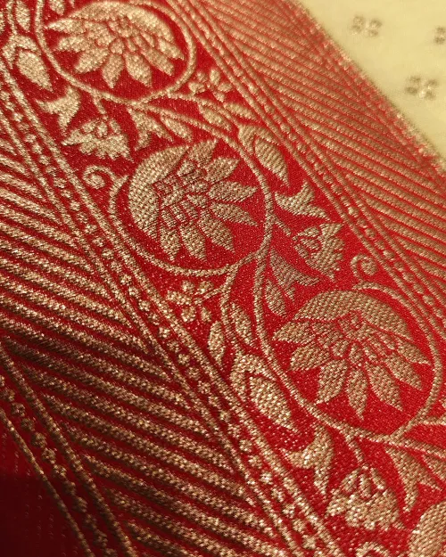 Whiteesh Cream Zari Work Dola Silk Saree