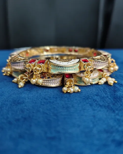 Golden Bangles with Red American Diamond